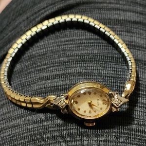 Vintage Women's Elgin 14 kt gold watch with diamonds